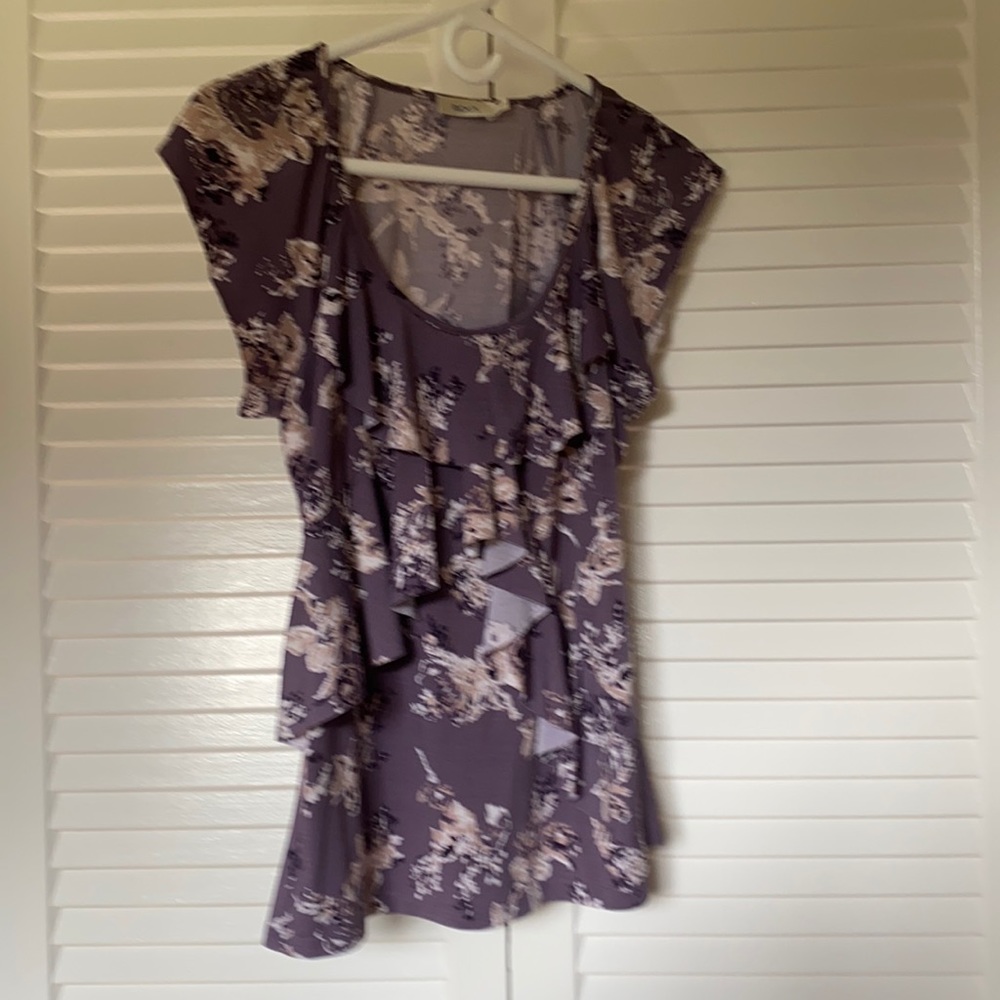 Ricki’s purple ruffle blouse
